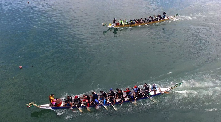 Dragon boat teams race each other on the waters of Sarangani Bay during the 2nd GenSan Tuna Festival Dragon Boat Race on Sunday (3 September 2017). Delegates from the Philippine National Police, Armed Forces of the Philippines, as well as amateur dragon paddlers, came to participate in the event. This year’s Tuna Festival carries the theme “A PEACEtival of fun – Bida sa Saya, Bida sa Tuna!” Photo courtesy of Cocoy Sexcion for GenSan CPIO Queen Tuna Park